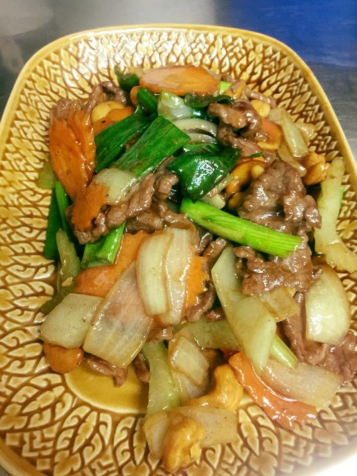 Fresh Thai stir-fry with beef, onion and cashews, cooked in-house at Thai Sontaya